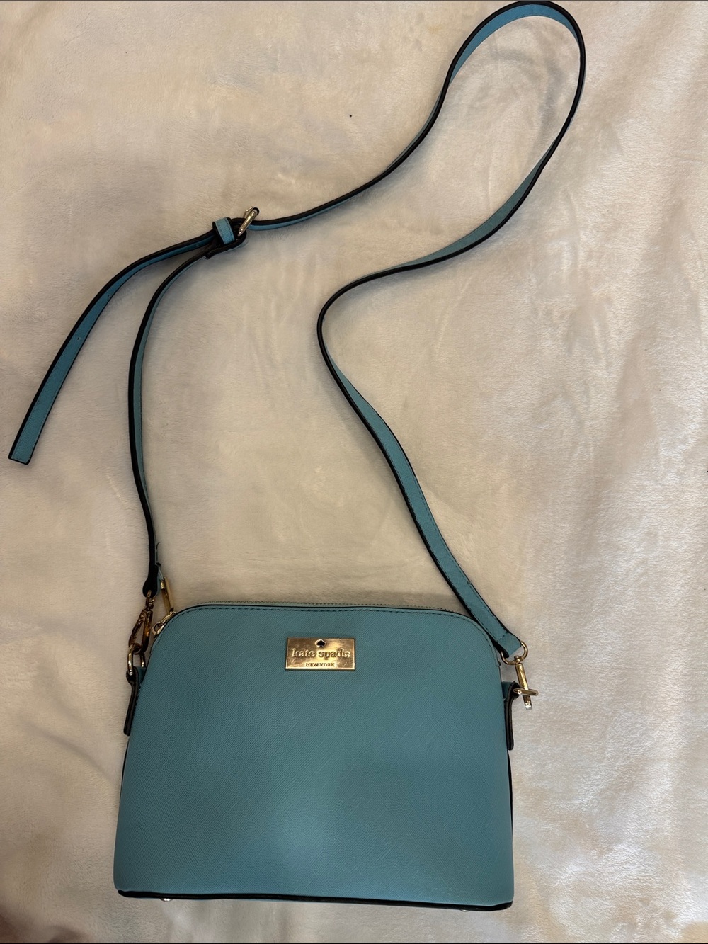 kate spade turquoise crossbody with gold logo